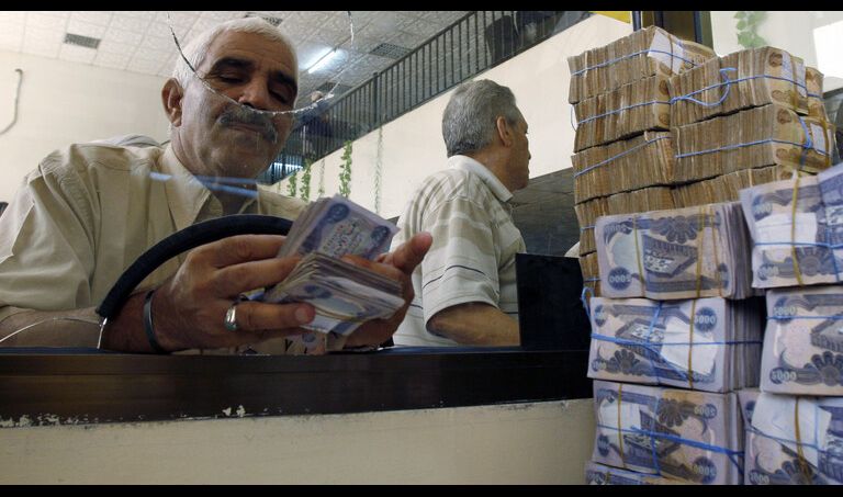 العراق يسدد أكثر من 20 مليار دولار من ديونه الخارجية